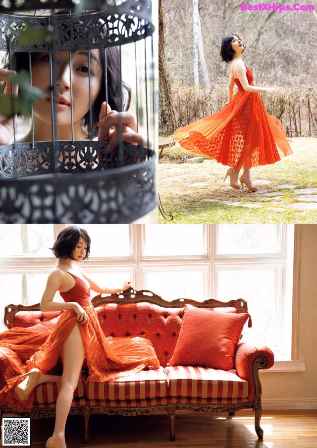 A woman in a red dress sitting on a red couch.